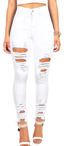 Vaqueros ajustados de cintura alta con rotos y dobladillo sin rematar