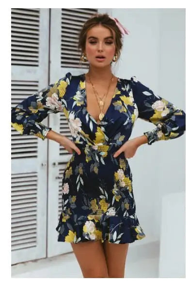 Vestido estampado con escote en V y cintura elástica cruzada