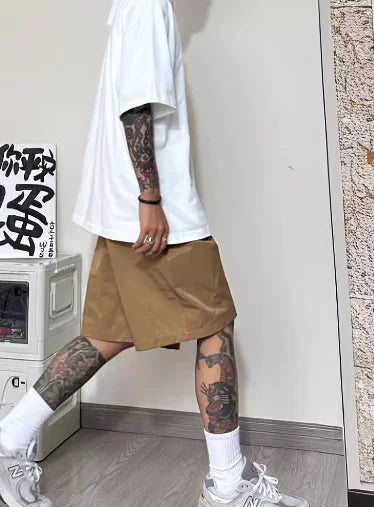 Pantalones anchos, holgados y recortados con cintura elástica